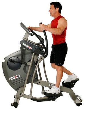 Man using an elliptical trainer